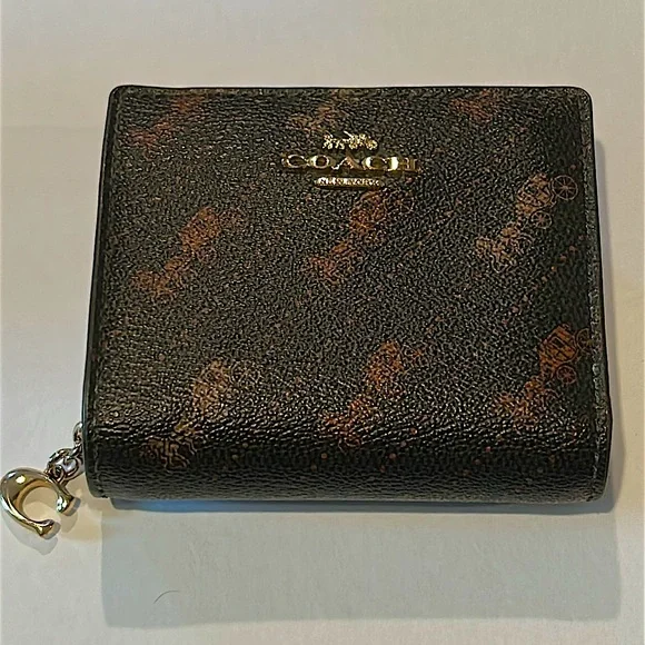 Coach Snap Wallet With Horse And Carriage Dot Print.
L: 4.25" W:1" H:3.5" - Picture 8 of 12